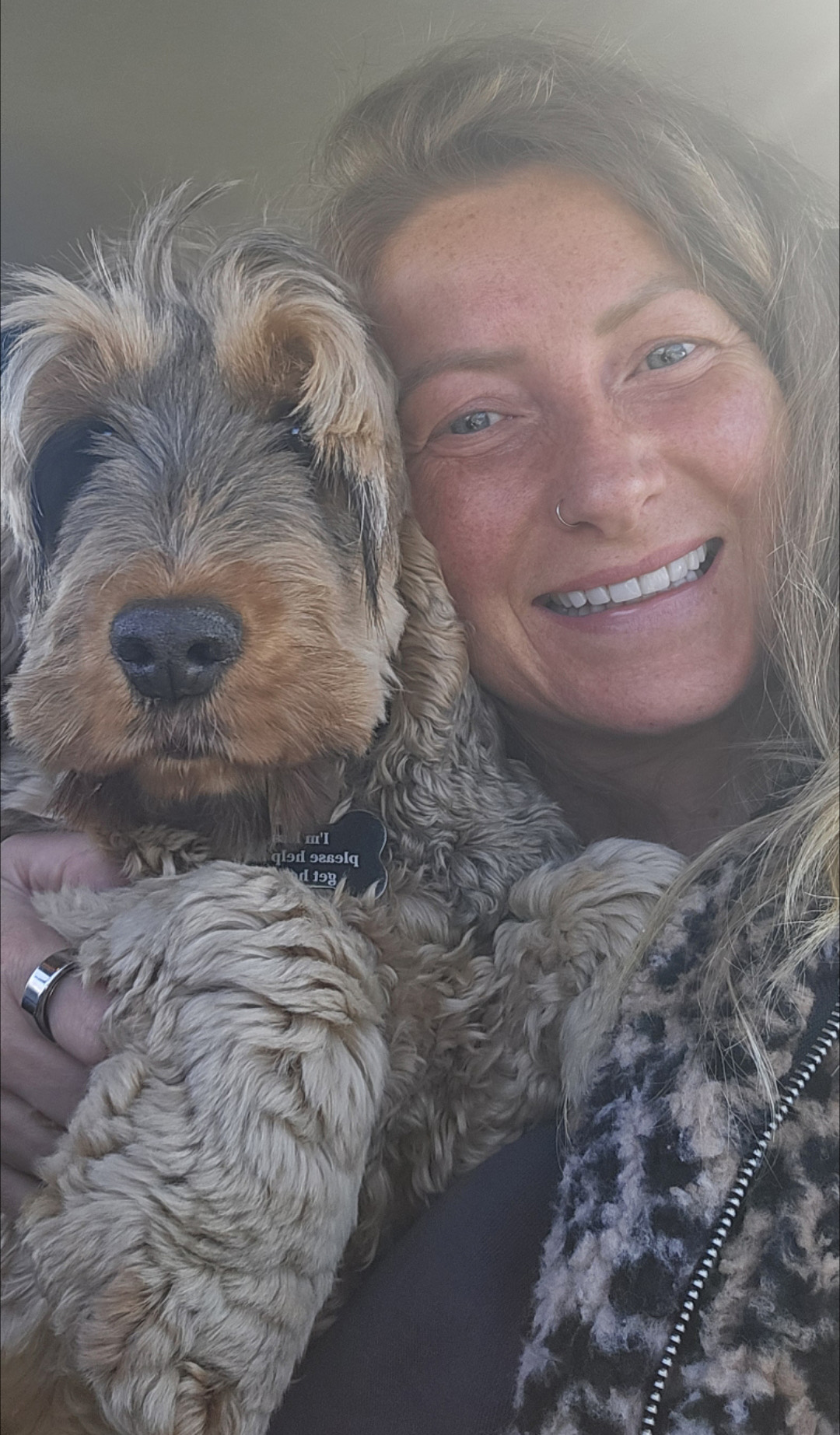 Sam Harrison with Saffy the cockapoo
